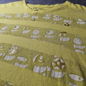4 x $15.  Ecko Unlimited Yellow Graphic Tee